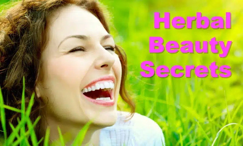 Herbal Beauty Secrets online course, herbal beauty secrets webinar, learn nutrition and lifestyle changes to optimize your appearance and possibly de-age yourself, improve your appearance, look longer with nutrition and herbal medicine, learn herbalist beauty secrets, learn nutritionist beauty secrets, learn health coach beauty secrets, Happy redhead woman faces right, smiling in the long grass.